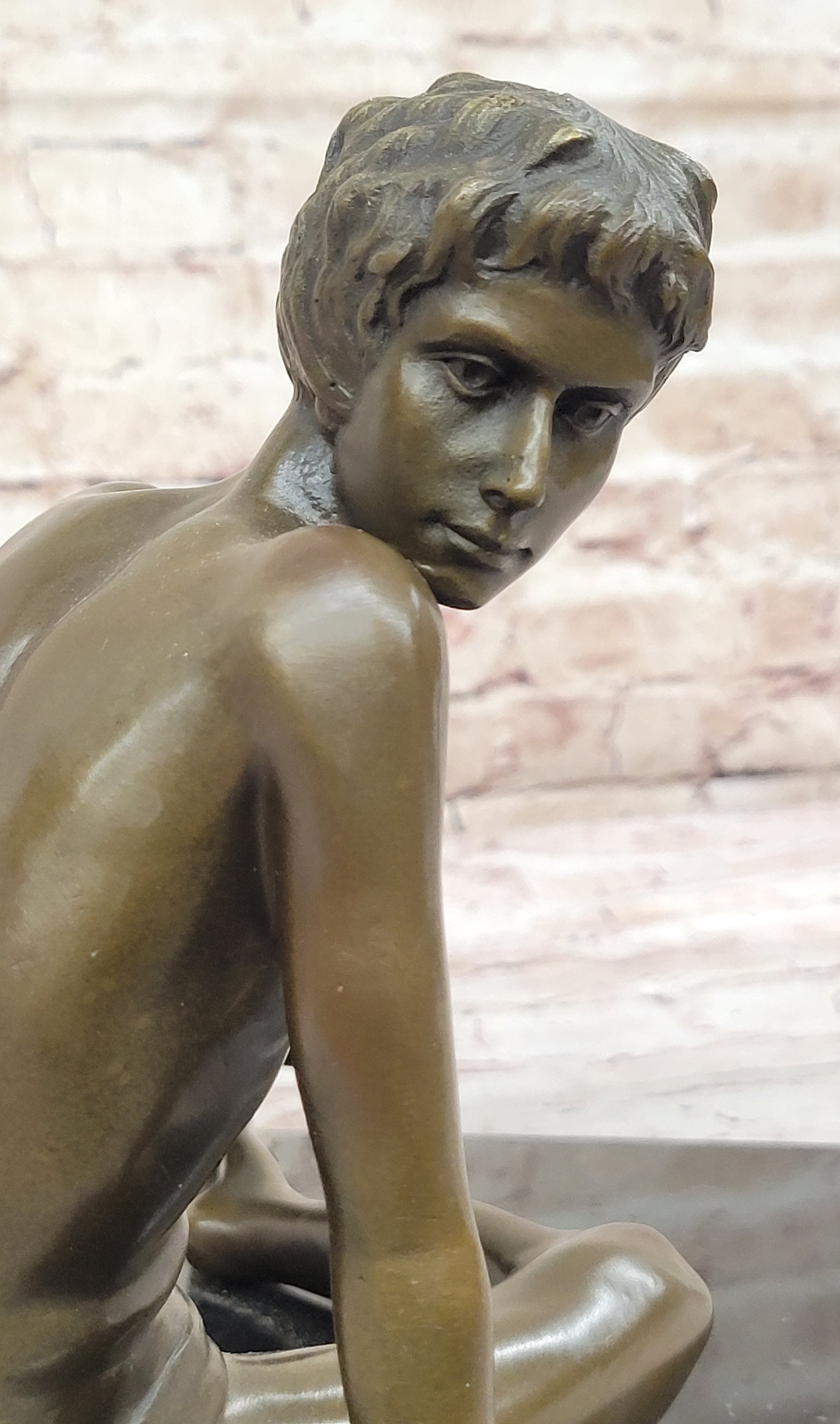 Young Man Reading a Book on the Beach - Bronze by Preiss