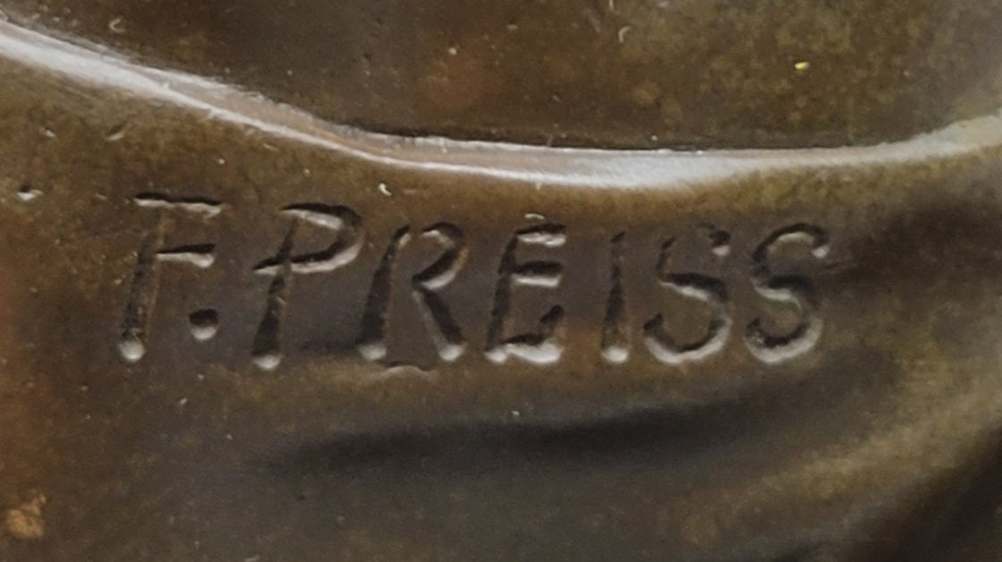 Young Man Reading a Book on the Beach - Bronze by Preiss