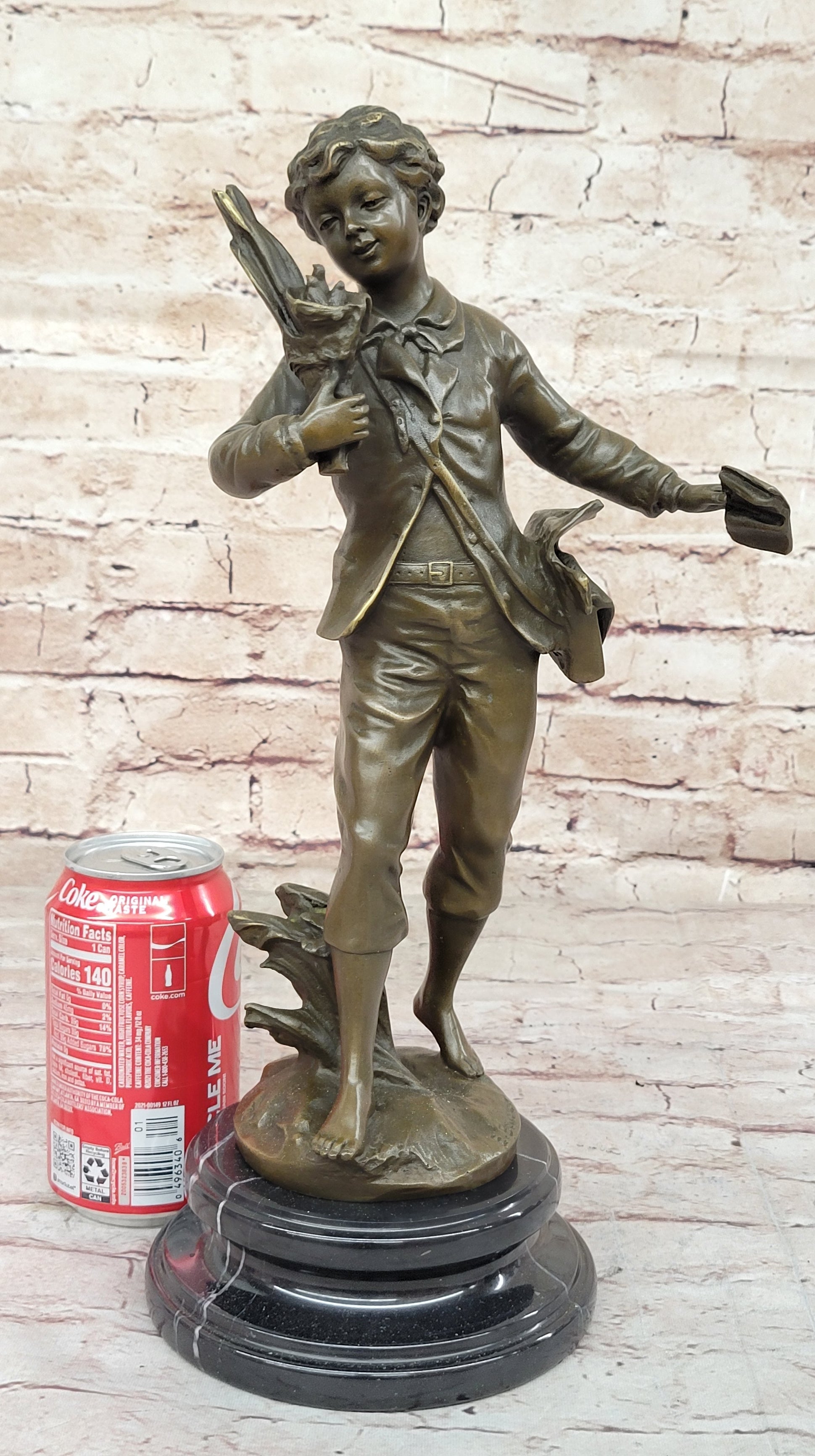 Young School Boy Carrying Supplies - 19th Century Reproduction Sculpture after Bruchon
