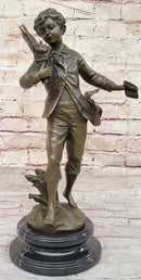 Young School Boy Carrying Supplies - 19th Century Reproduction Sculpture after Bruchon