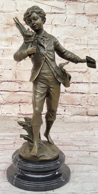 Young School Boy Carrying Supplies - 19th Century Reproduction Sculpture after Bruchon