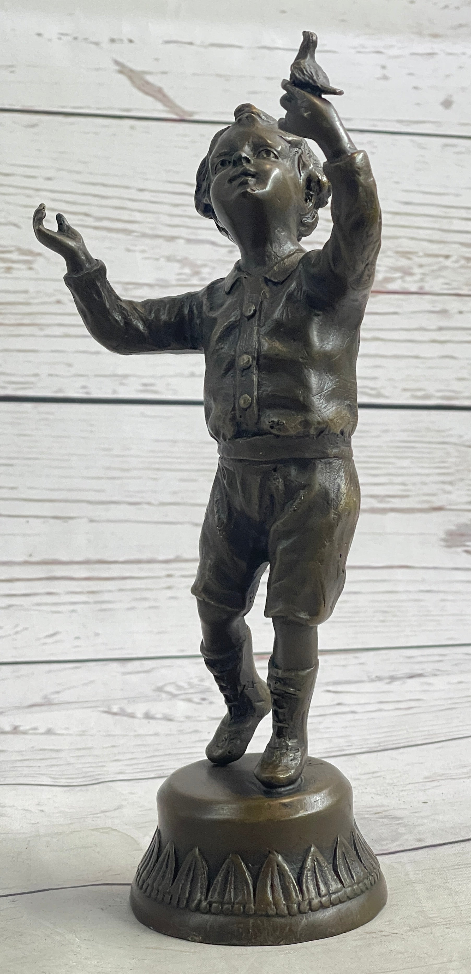 Bronze Sculpture of Child Holding Bird - Signed Milo Art