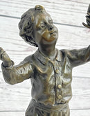 Bronze Sculpture of Child Holding Bird - Signed Milo Art