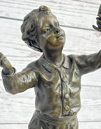 Bronze Sculpture of Child Holding Bird - Signed Milo Art