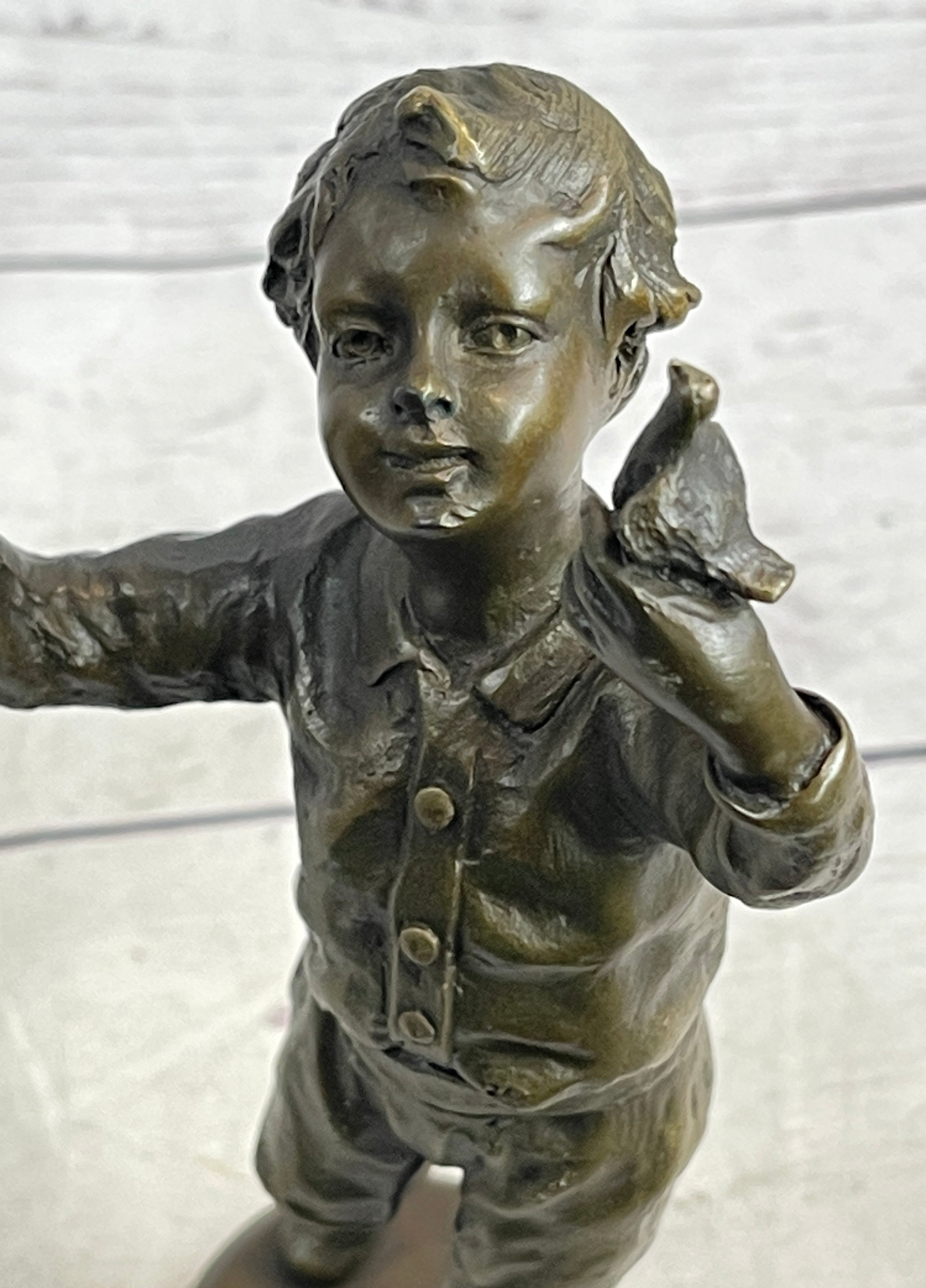 Bronze Sculpture of Child Holding Bird - Signed Milo Art