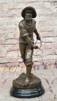 Bronze Fisherman with Net – Nautical Sculpture on Marble
