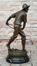 Bronze Fisherman with Net – Nautical Sculpture on Marble