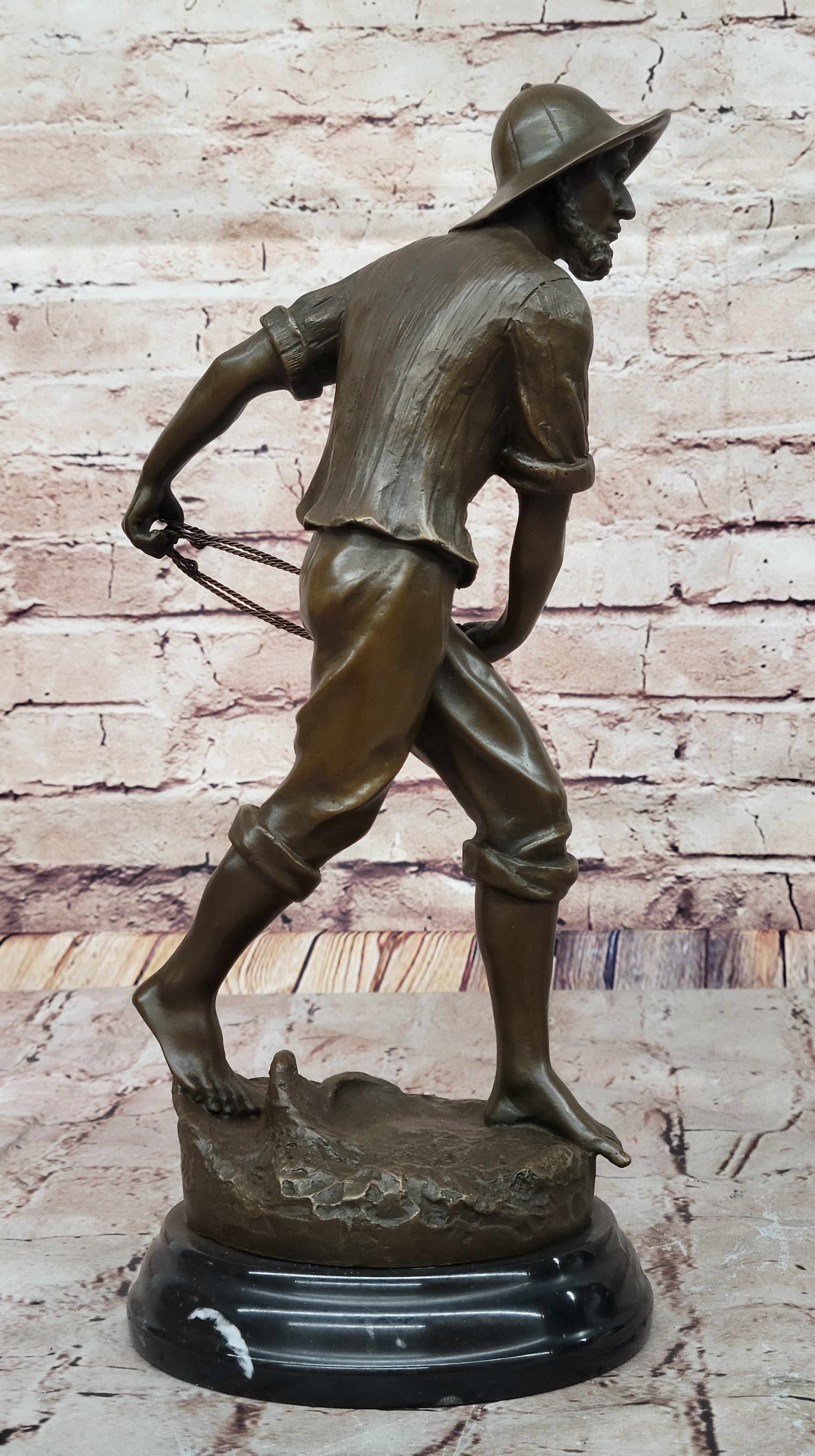 Bronze Fisherman with Net – Nautical Sculpture on Marble