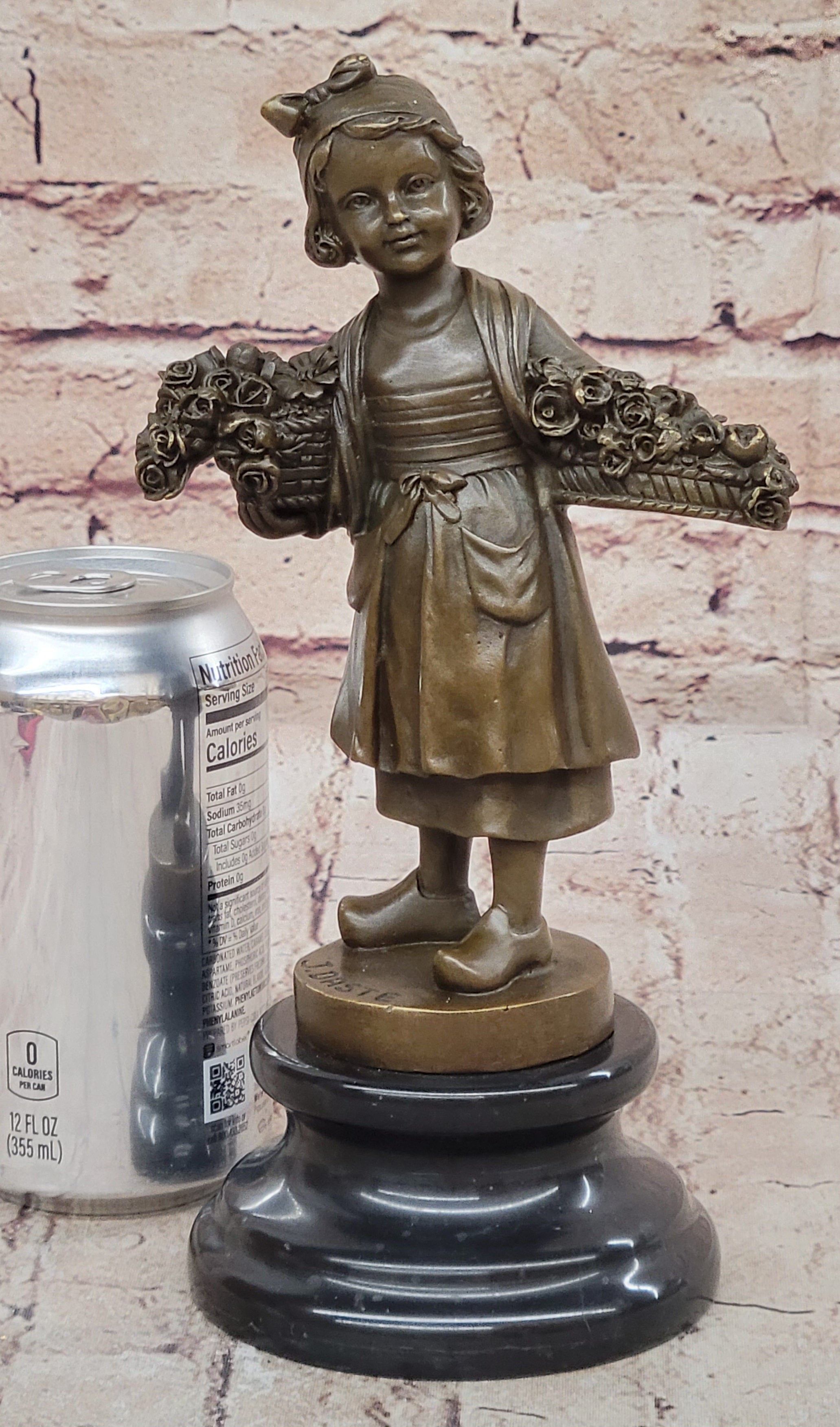 Young Girl Carrying Flower Basket - Bronze by Daste
