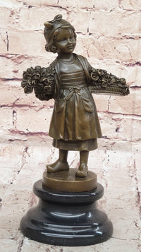 Young Girl Carrying Flower Basket - Bronze by Daste