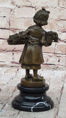 Young Girl Carrying Flower Basket - Bronze by Daste