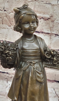 Young Girl Carrying Flower Basket - Bronze by Daste