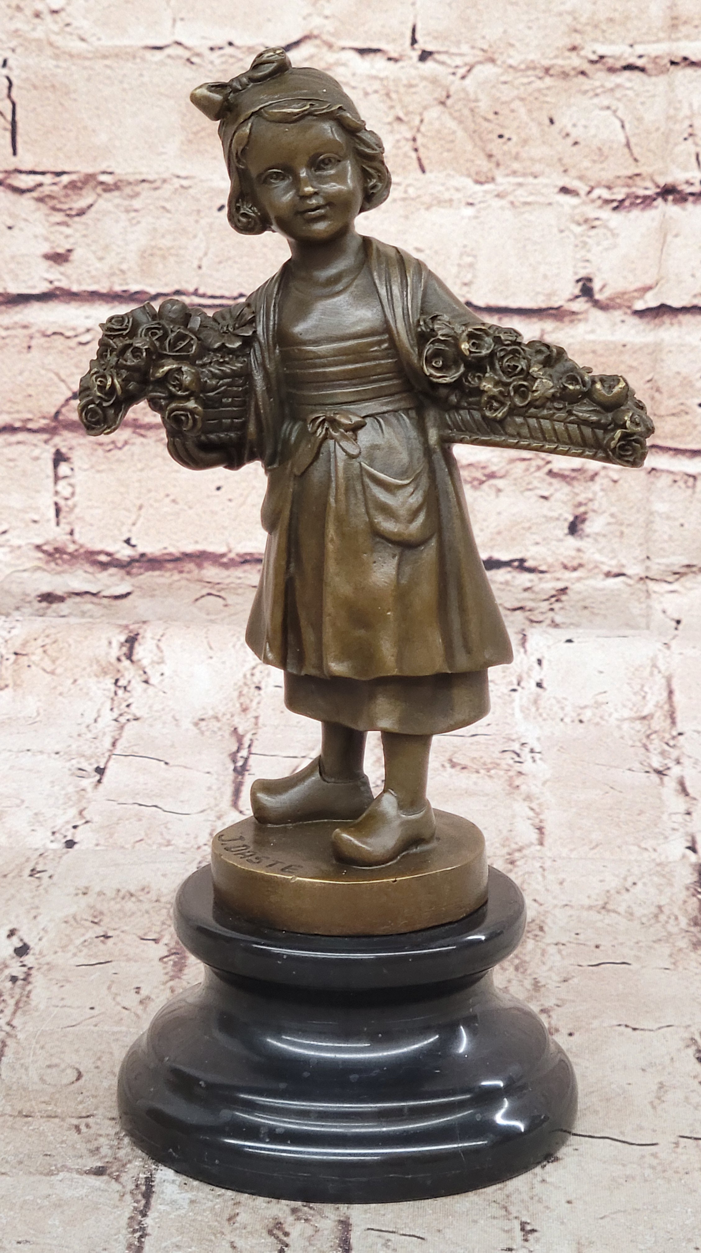 Young Girl Carrying Flower Basket - Bronze by Daste