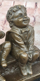 'Watching Something' Bronze Sculpture of Three Children Laughing and Sitting by Juan Clara
