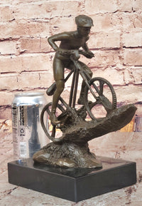 Cyclist on Rocky Terrain Bronze by Mario Nick
