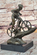 Cyclist on Rocky Terrain Bronze by Mario Nick