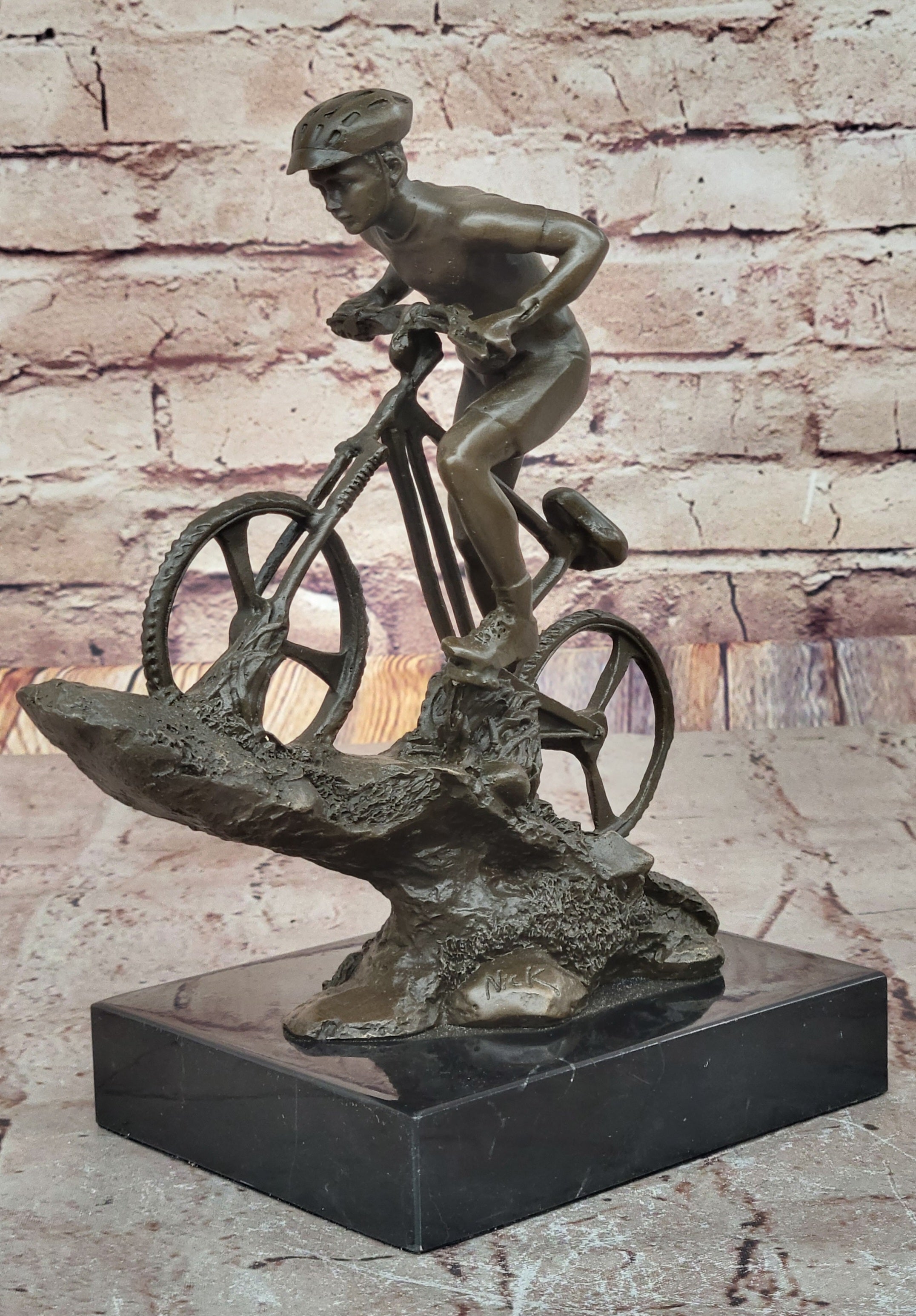Cyclist on Rocky Terrain Bronze by Mario Nick