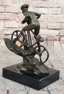 Cyclist on Rocky Terrain Bronze by Mario Nick