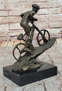 Cyclist on Rocky Terrain Bronze by Mario Nick