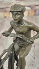Cyclist on Rocky Terrain Bronze by Mario Nick