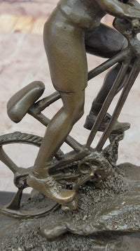 Cyclist on Rocky Terrain Bronze by Mario Nick