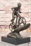 Cyclist on Rocky Terrain Bronze by Mario Nick