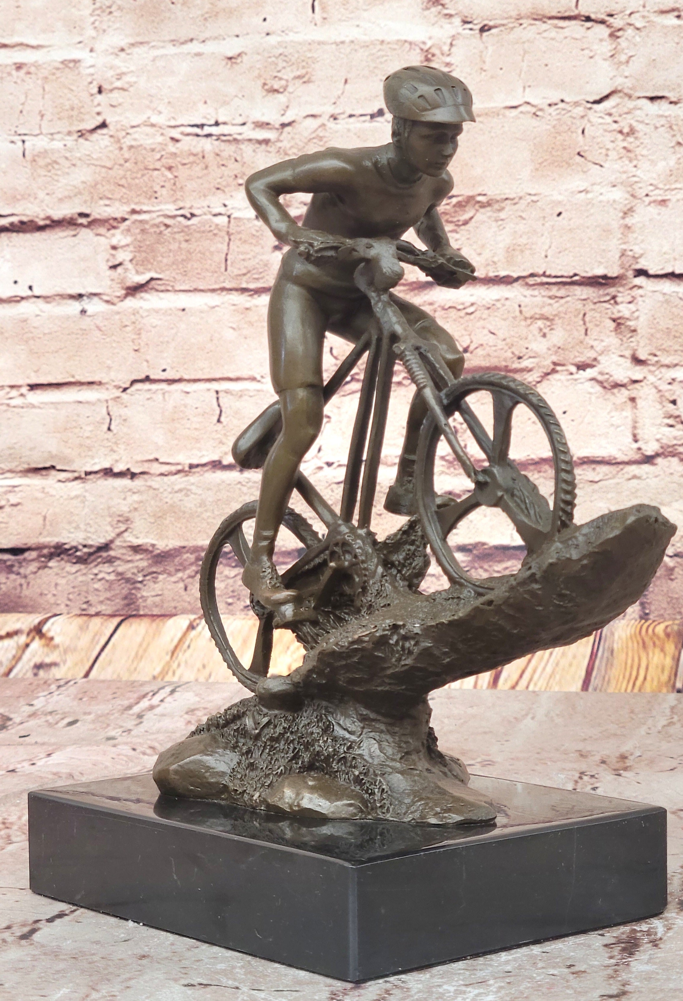 Cyclist on Rocky Terrain Bronze by Mario Nick