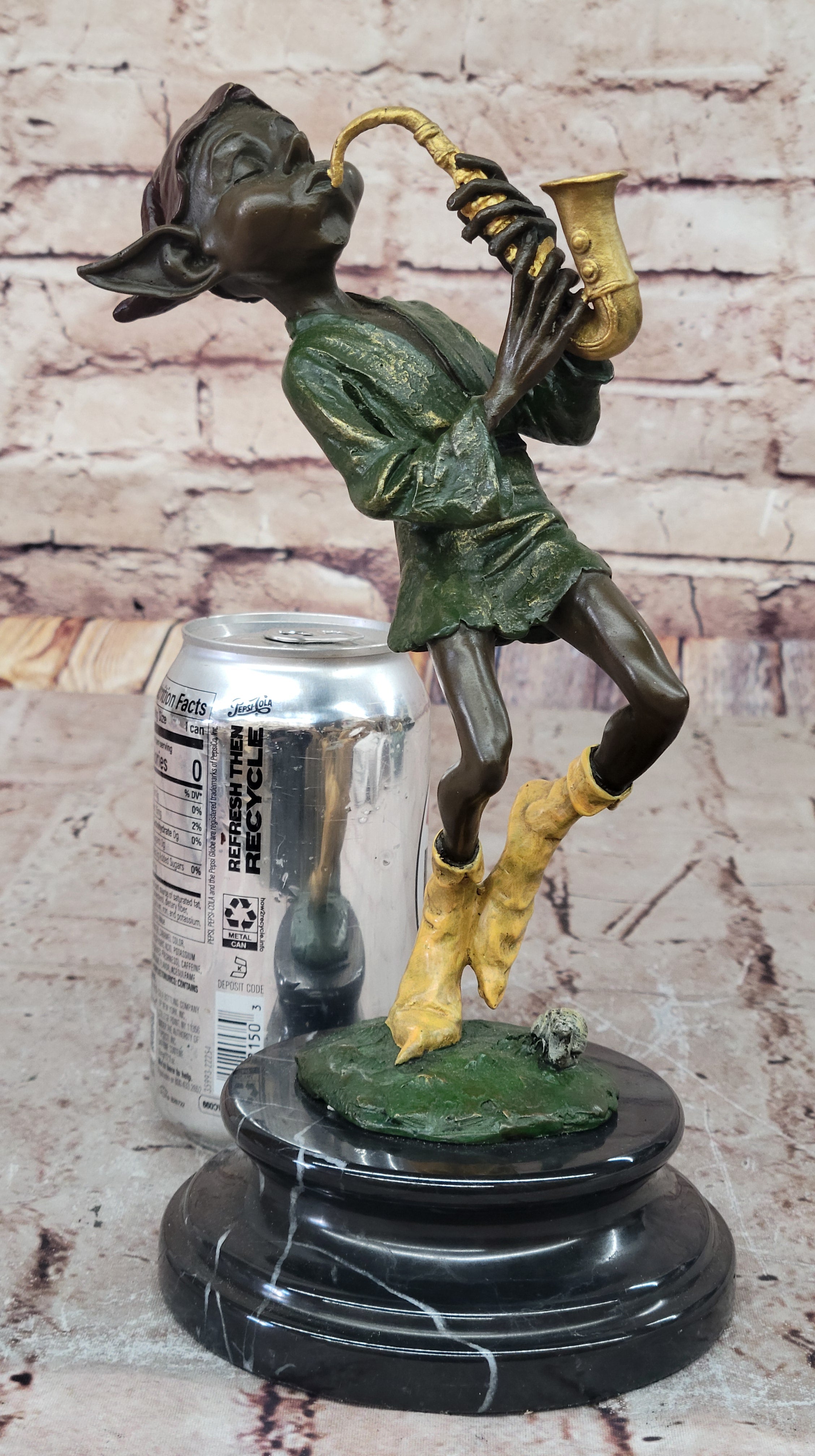Bronze Elf Leprechaun Playing Golden Saxophone by Juno