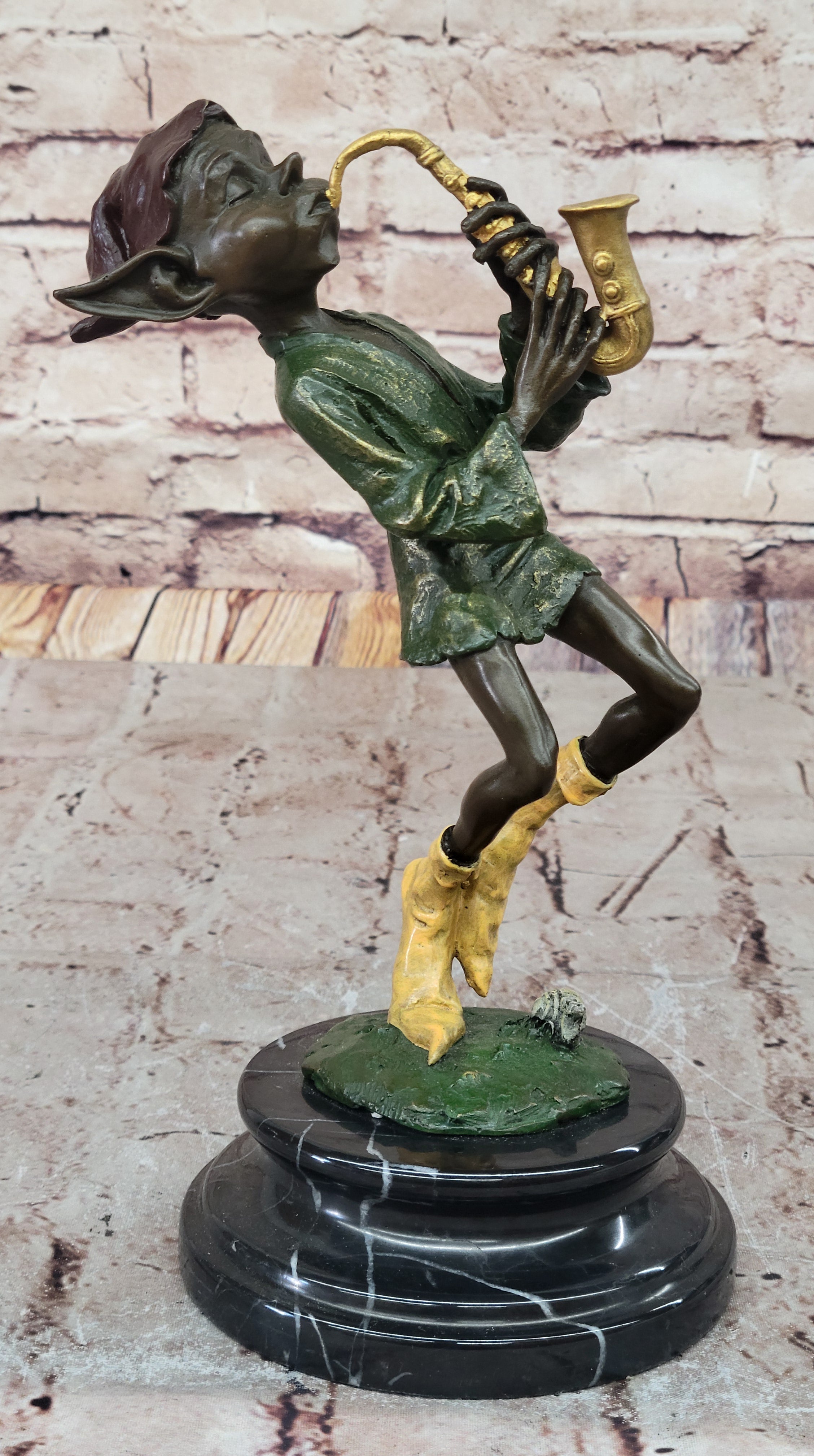 Bronze Elf Leprechaun Playing Golden Saxophone by Juno