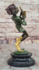 Bronze Elf Leprechaun Playing Golden Saxophone by Juno