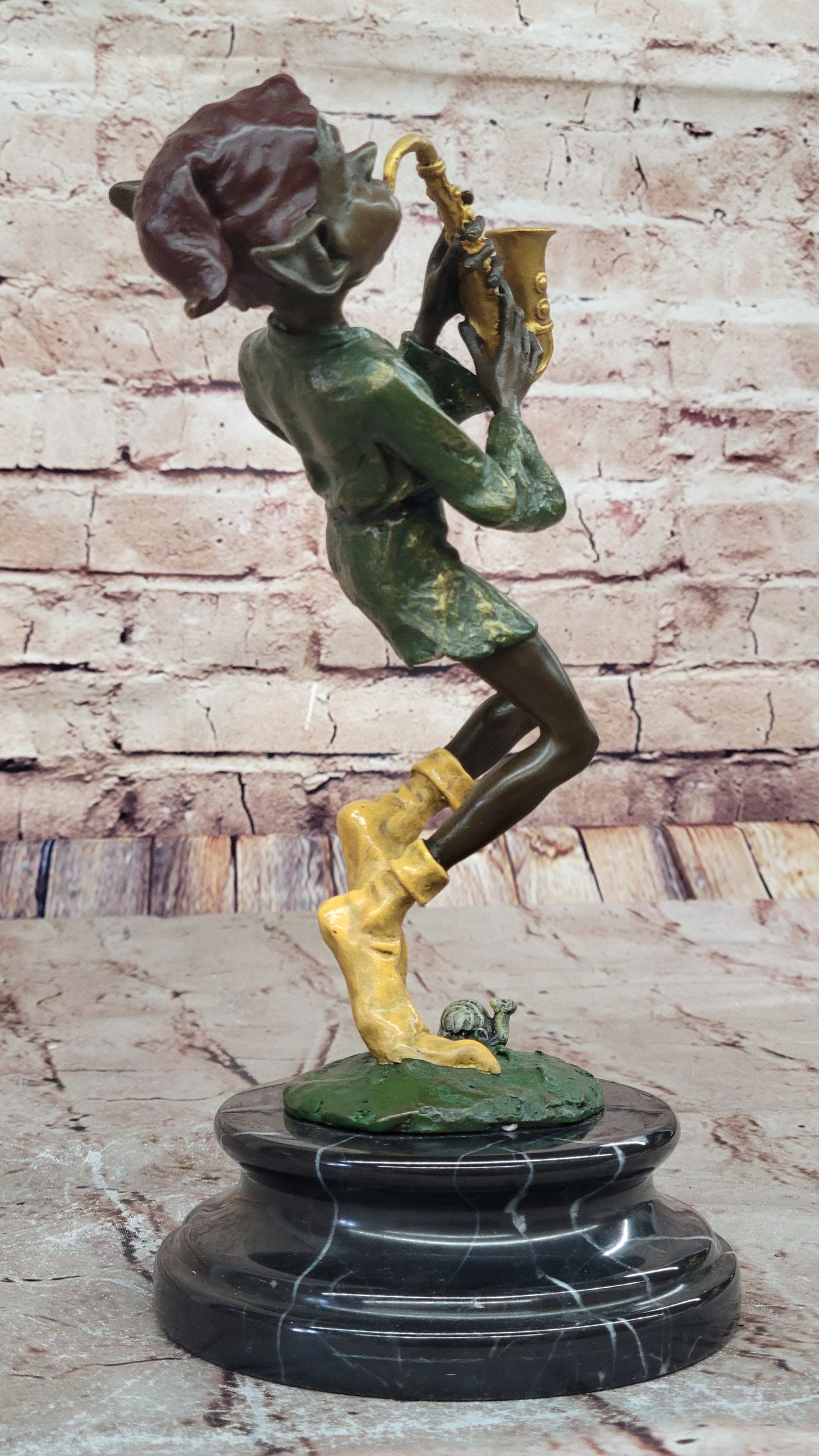 Bronze Elf Leprechaun Playing Golden Saxophone by Juno