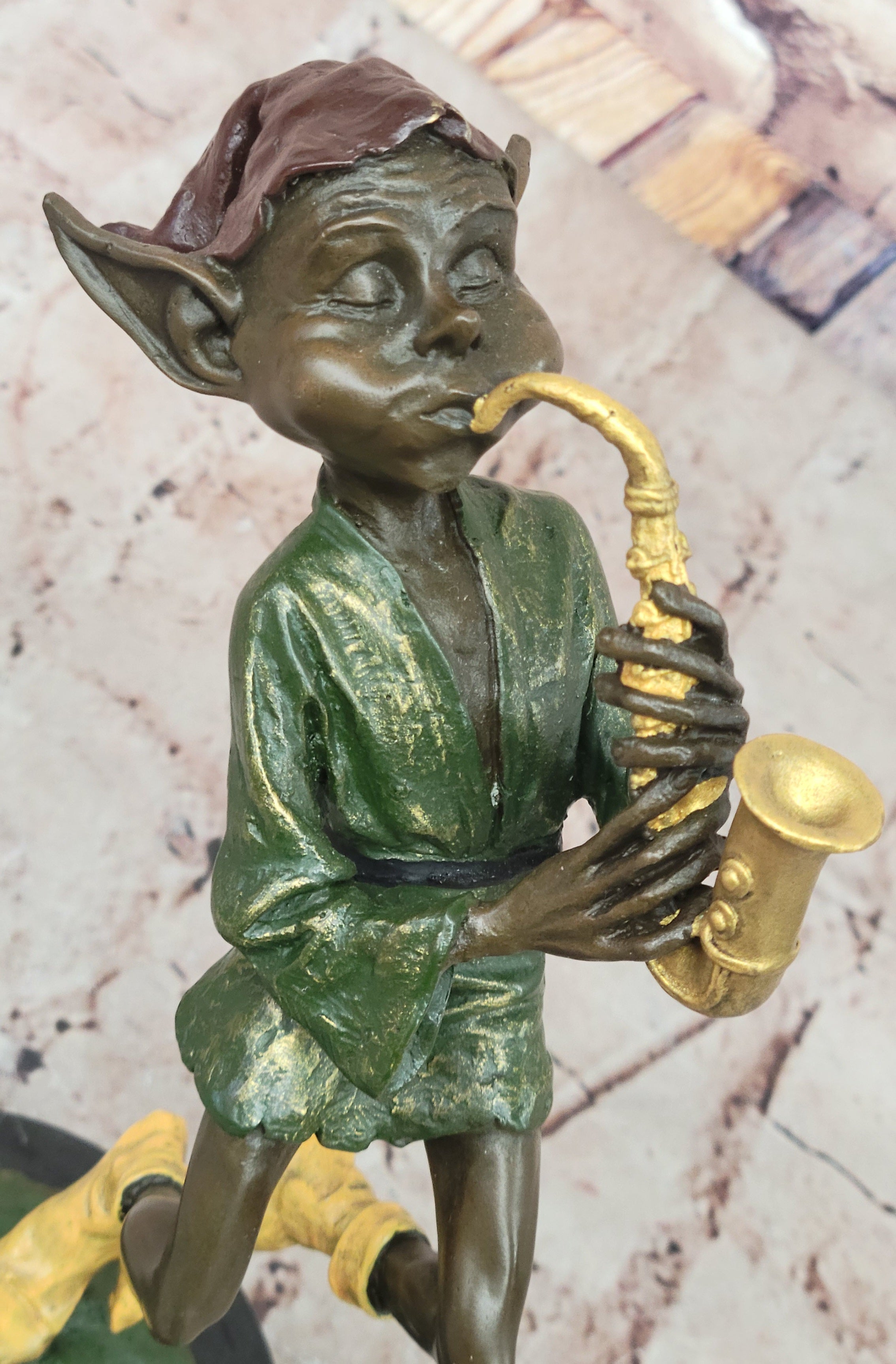 Bronze Elf Leprechaun Playing Golden Saxophone by Juno