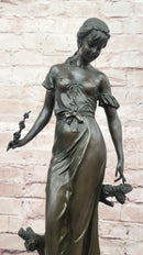 Graceful Bronze Lady Sculpture Holding a Floral Branch, Standing on a Marble Pedestal Base