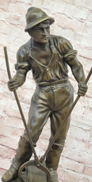 Signed Mavchi Male Metal Forge Worker Real Hand Made Bronze Sculpture