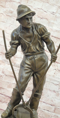 Signed Mavchi Male Metal Forge Worker Real Hand Made Bronze Sculpture