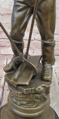 Signed Mavchi Male Metal Forge Worker Real Hand Made Bronze Sculpture