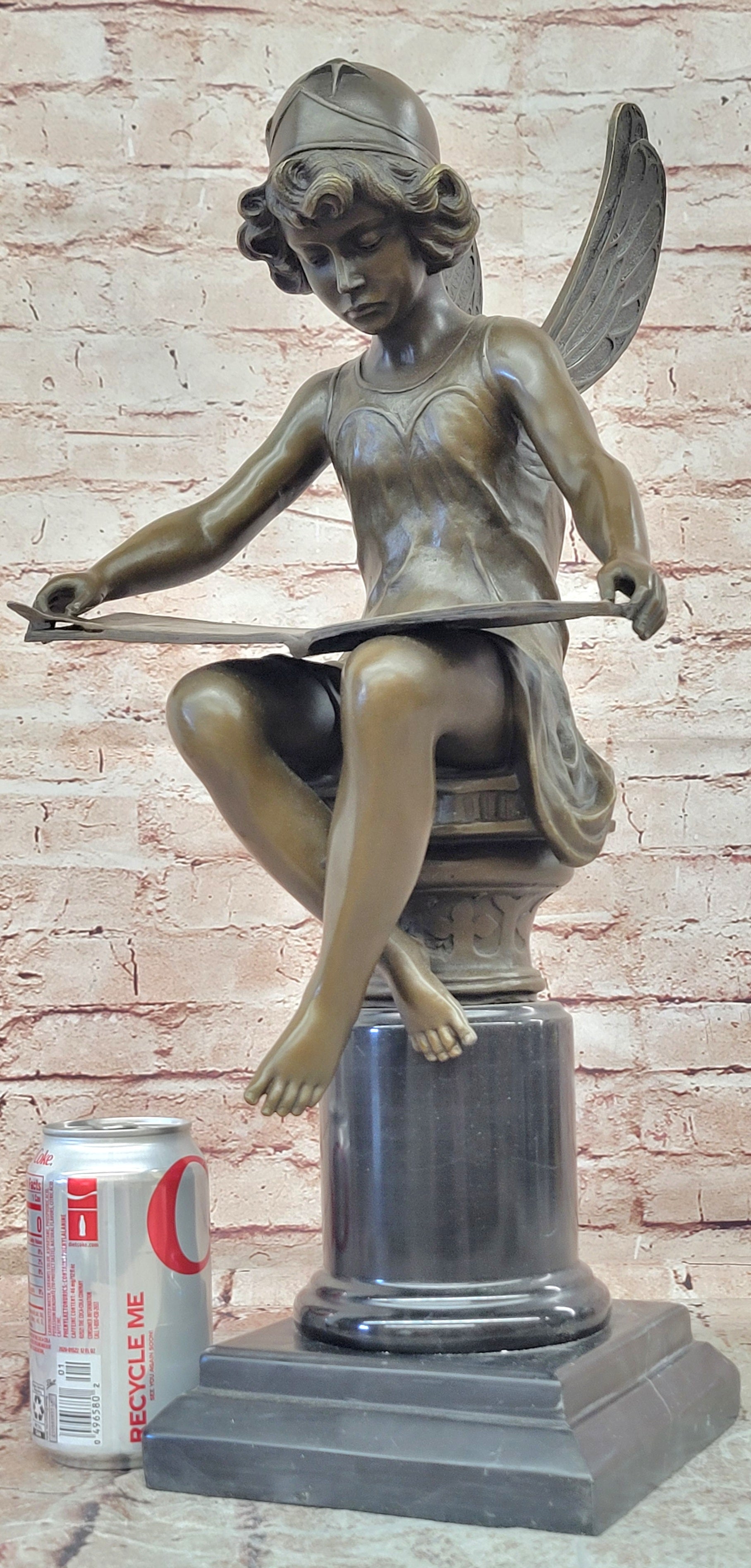 Bronze Figure of a Seated Angel Reading a Book signed Moreau Hand Made