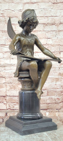 Bronze Figure of a Seated Angel Reading a Book signed Moreau Hand Made