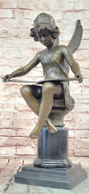 Bronze Figure of a Seated Angel Reading a Book signed Moreau Hand Made