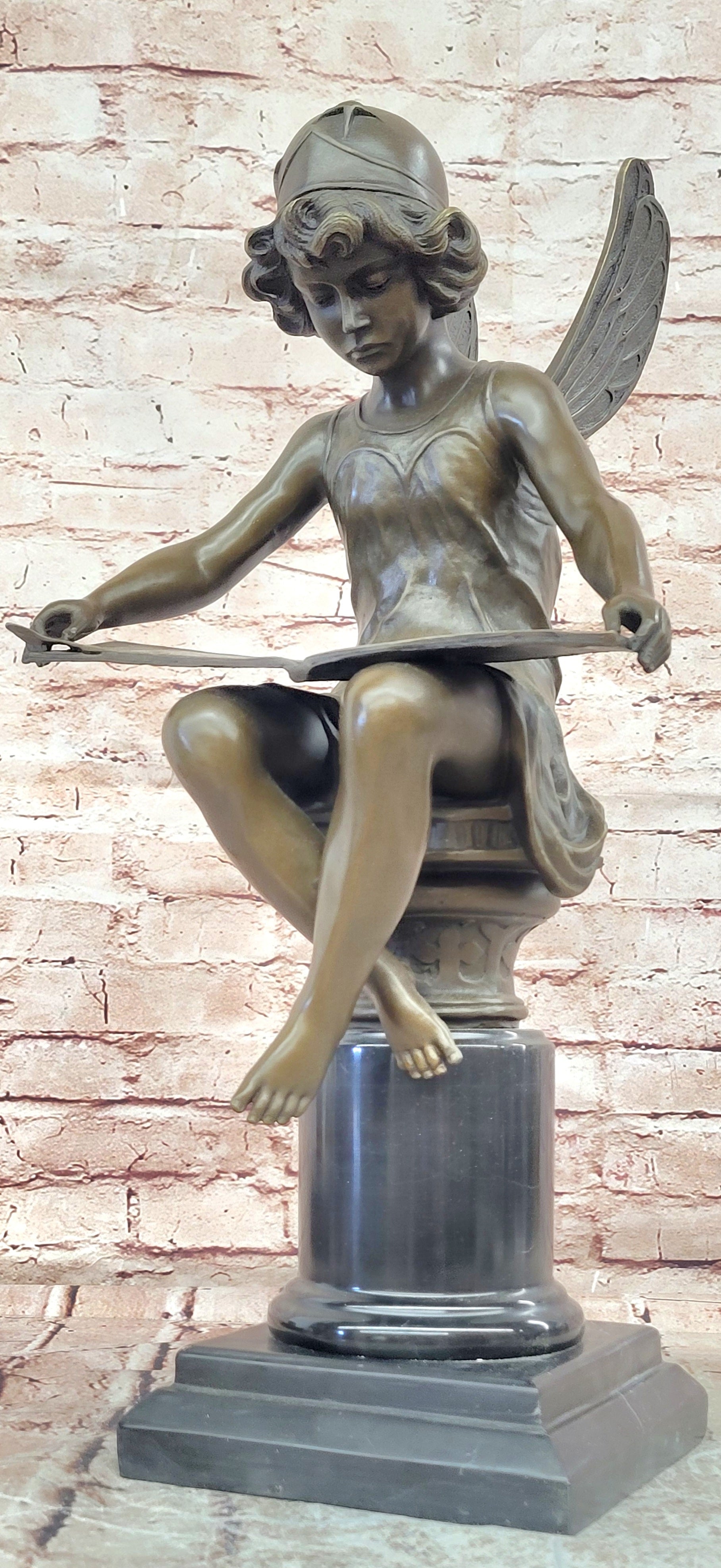 Bronze Figure of a Seated Angel Reading a Book signed Moreau Hand Made