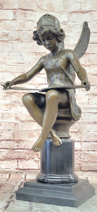 Bronze Figure of a Seated Angel Reading a Book signed Moreau Hand Made