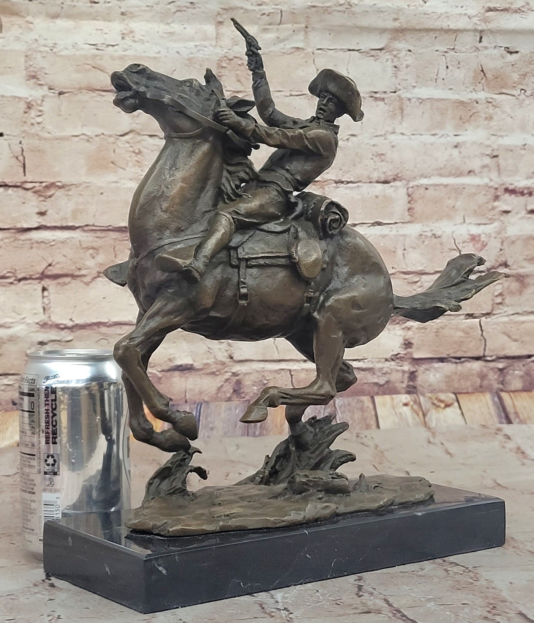 Galloping Cowboy with Revolver – Bronze Western Sculpture Remington