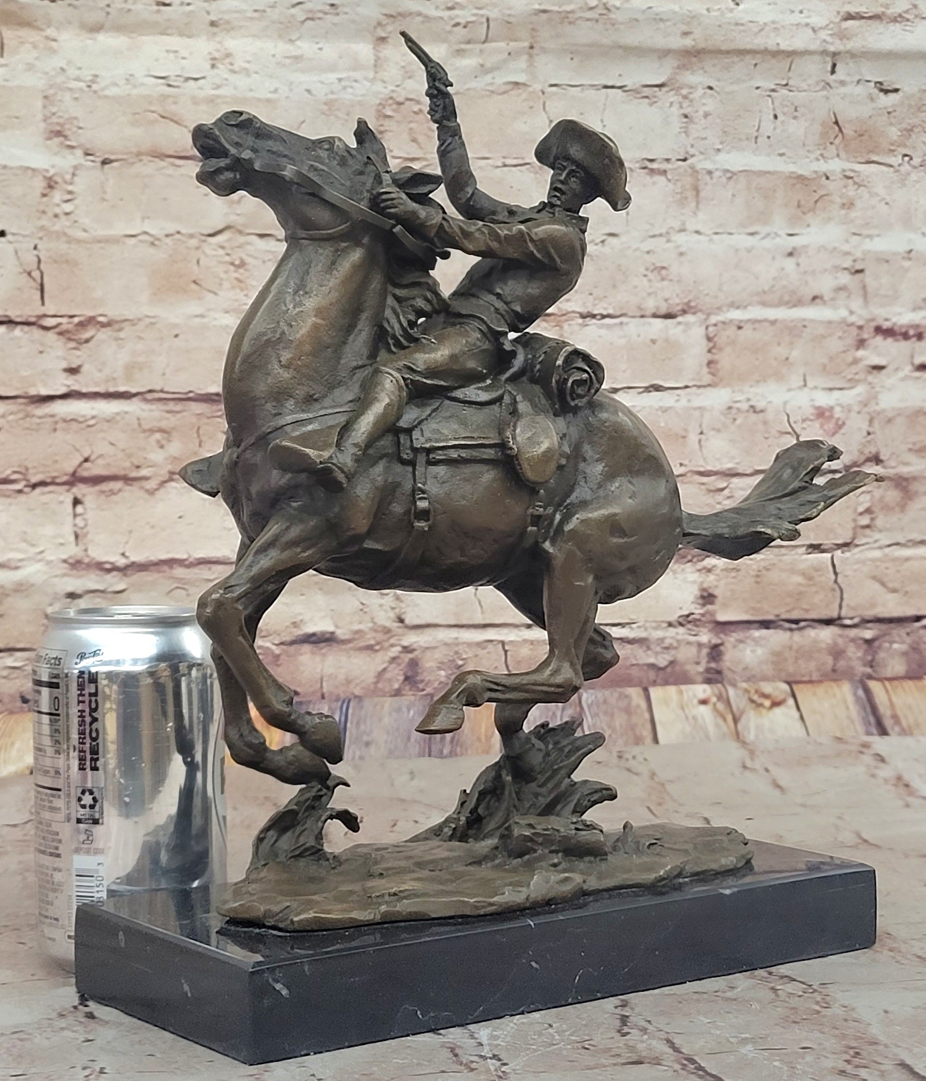 Galloping Cowboy with Revolver – Bronze Western Sculpture Remington
