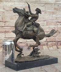 Galloping Cowboy with Revolver – Bronze Western Sculpture Remington