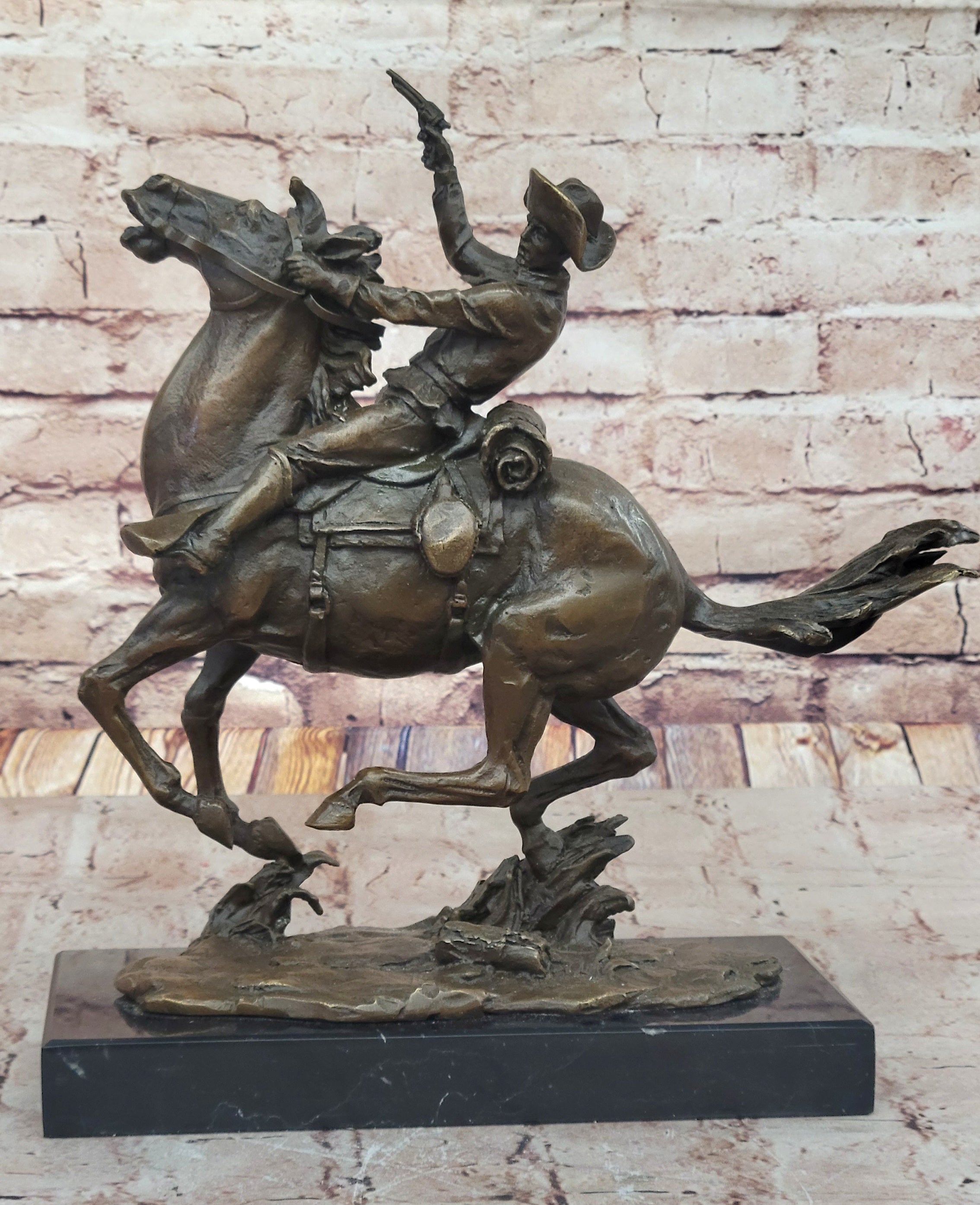 Galloping Cowboy with Revolver – Bronze Western Sculpture Remington