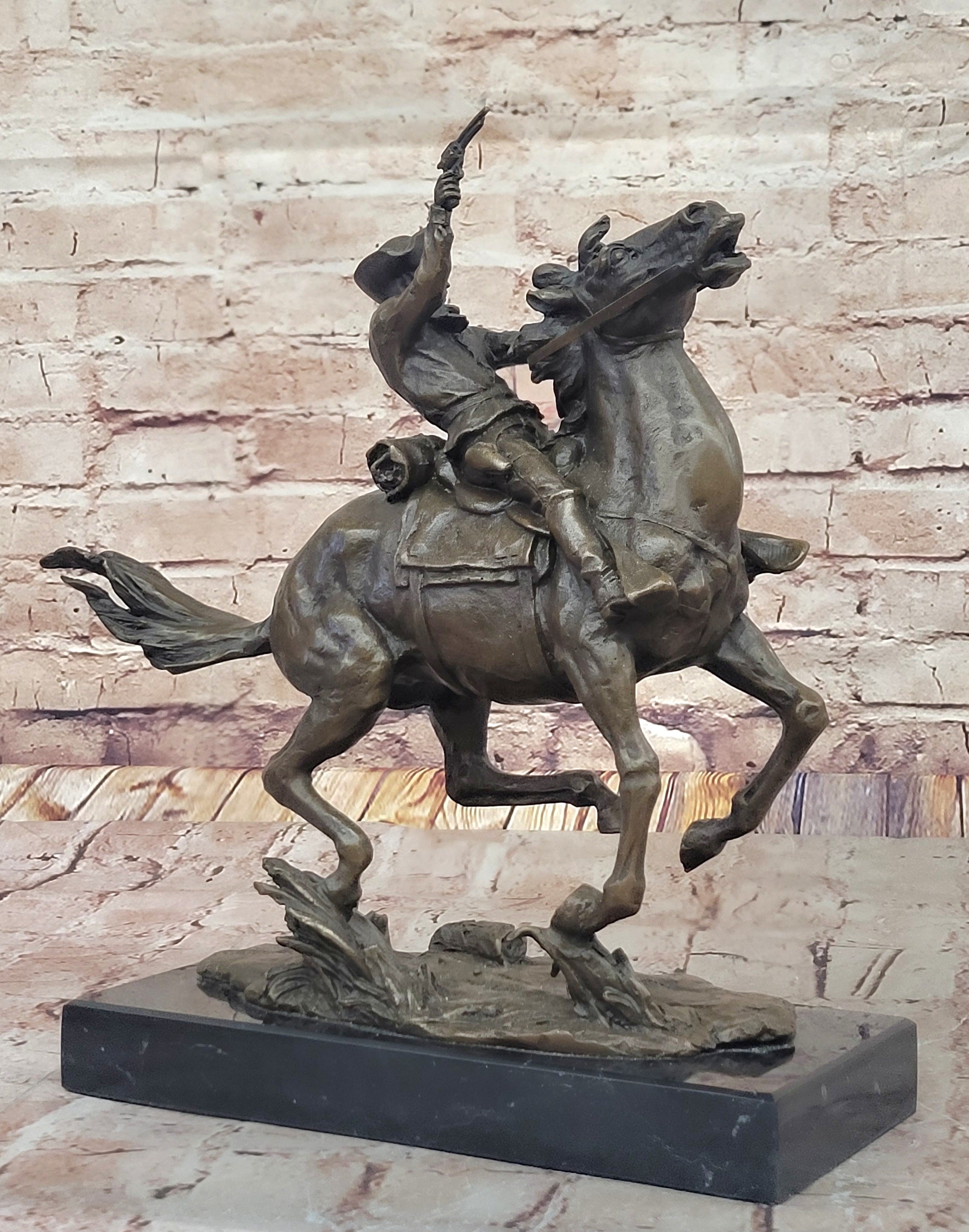 Galloping Cowboy with Revolver – Bronze Western Sculpture Remington