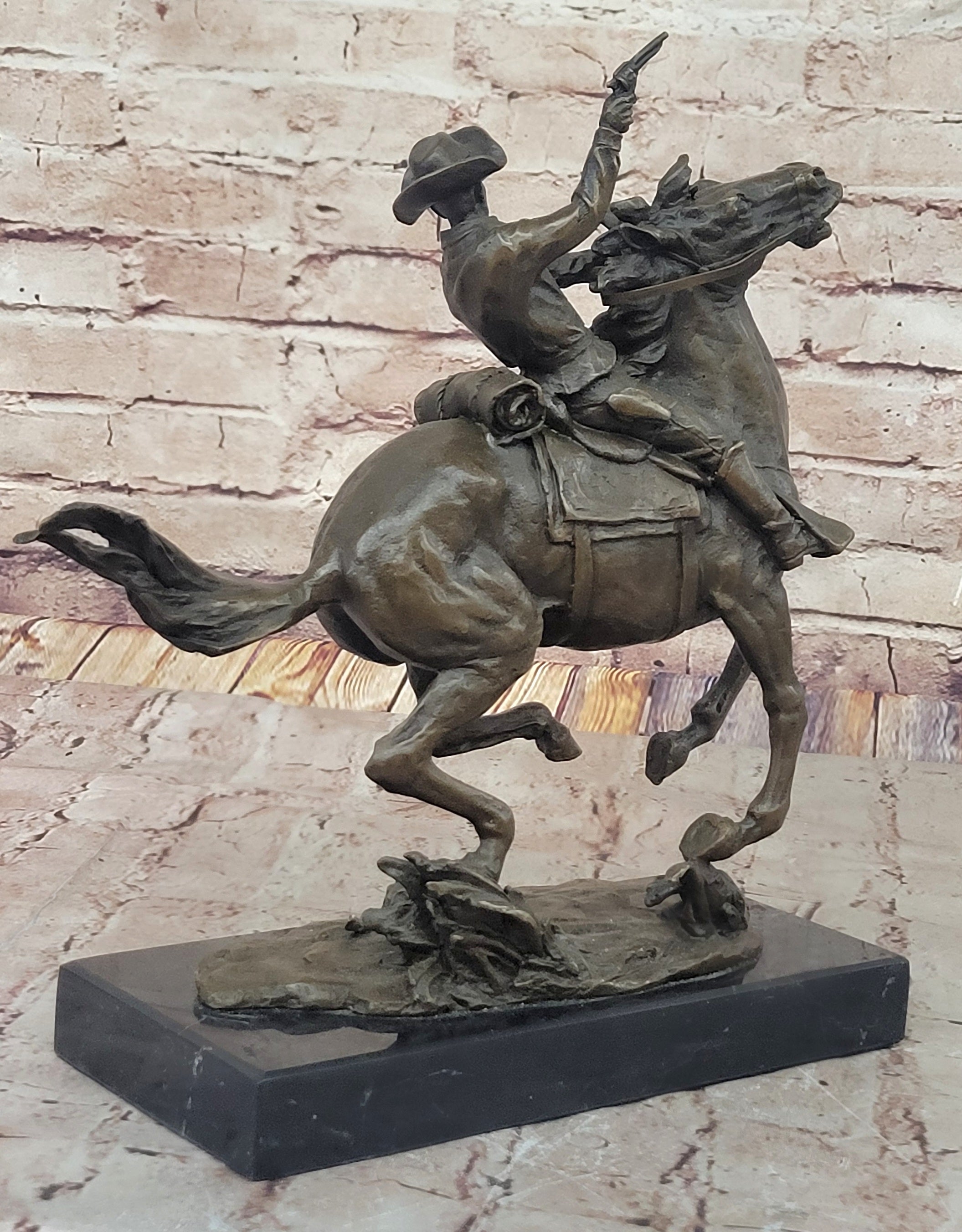 Galloping Cowboy with Revolver – Bronze Western Sculpture Remington