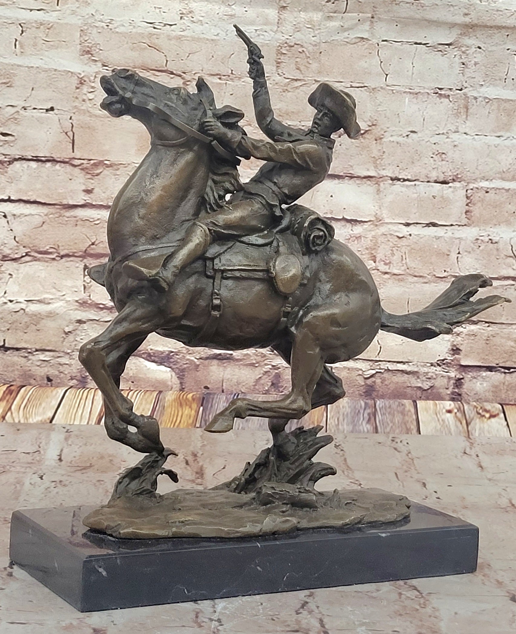 Galloping Cowboy with Revolver – Bronze Western Sculpture Remington