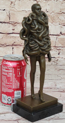 Bronze Sculpture of Woman Wearing Snakes - Unwavering by Pascal Delor