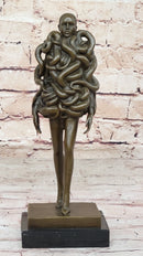 Bronze Sculpture of Woman Wearing Snakes - Unwavering by Pascal Delor